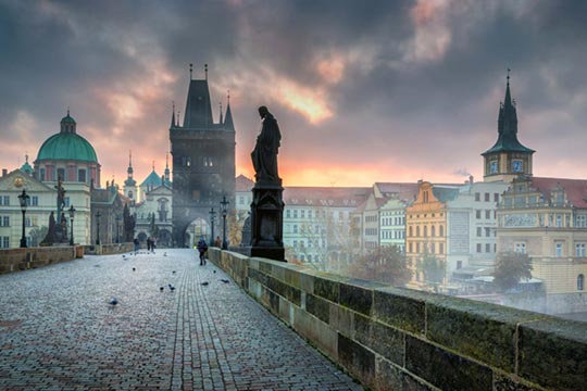 The Charles Bridge in Prague in foggy morning