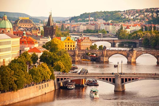 Vltava river, bridges and boats in Prague
