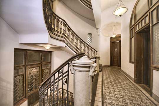 The Residence Brehova hall with staircase and elevator